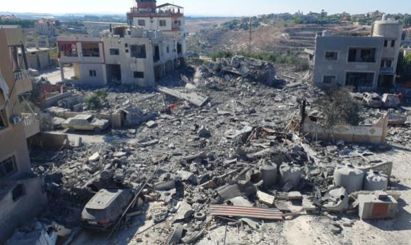 The rubble of destroyed buildings lies at the site of Israeli strikes in Saksakiyeh, southern Lebanon September 26, 2024. REUTERS/Ali Hankir